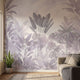Seamless tropical paradise mural at twilight with purple florals and lush greenery covering the wall.