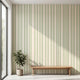 Urban interior scene with Olivia mural covering a large wall with seamless pattern in natural light.