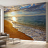 Vibrant beach sunset mural covering a large wall in a modern living room, showcasing colorful sky and calm ocean.