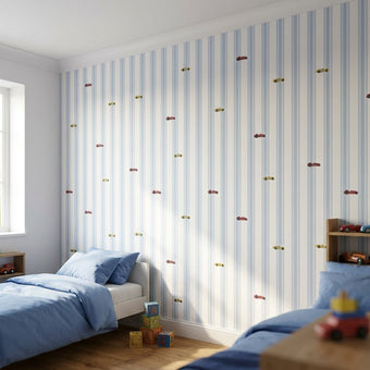 Vivid mural in a young boy's bedroom with blue, white, yellow, and red striped wallpaper featuring cars.