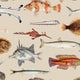 Vintage marine wallpaper with a seamless repeat, featuring antique style fish illustrations in soft natural tones, creating a timeless coastal look. Displayed on a wall in a coastal inspired living room. 