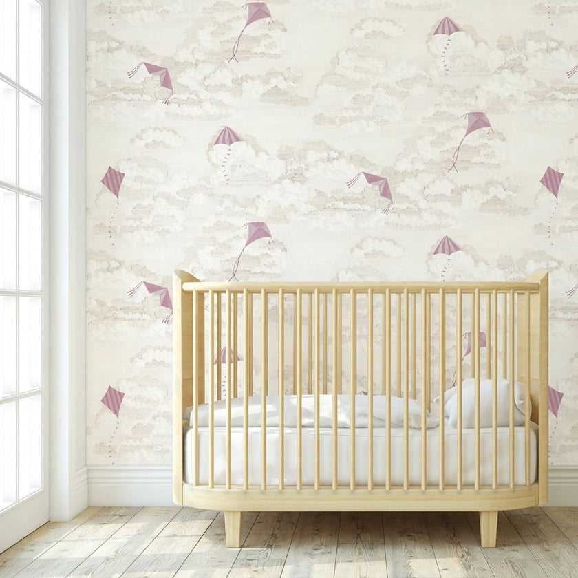 Close-up of 'Where's My Kite?' pink mural with colorful kites in a bright nursery setting, wall-mounted and fully covering the wall.