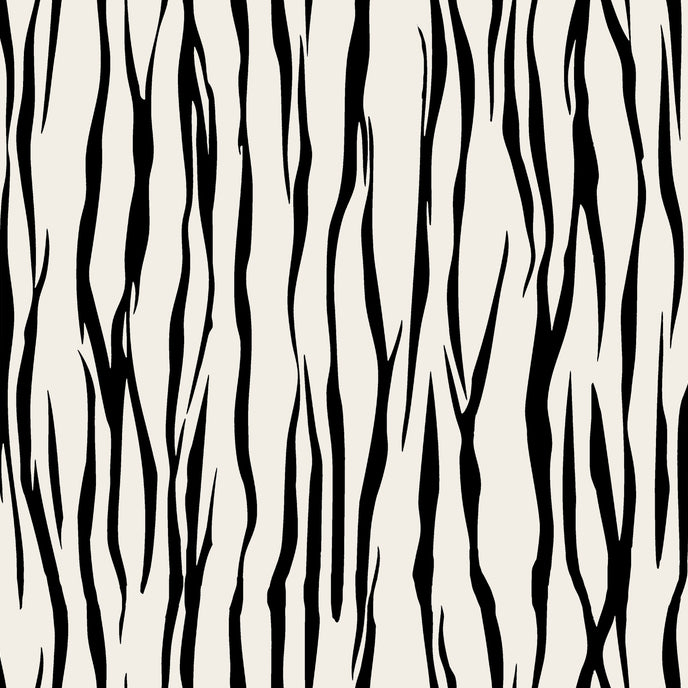Vertical zebra stripe wallpaper with a seamless repeat, featuring flowing black stripes on a white background in a bold animal inspired pattern.